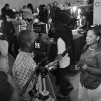 Host Ashley Simpson giving an interview